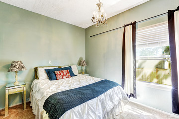 Light mint bedroom with bed