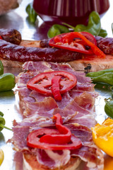 Mediterranean food, barbecue with sausages and pork sausages