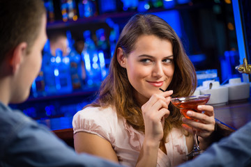 young woman in a bar