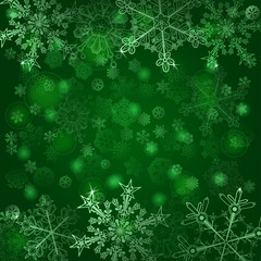 Background of snowflakes in green colors