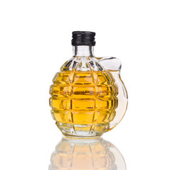 Glass of whiskey with grenade.