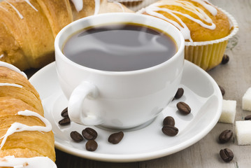 cup of hot coffee with muffin