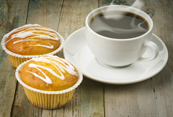 cup of hot coffee with muffin