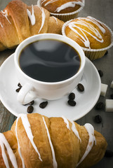 cup of hot coffee with muffin