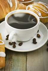 cup of hot coffee with muffin