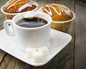 cup of hot coffee with muffin