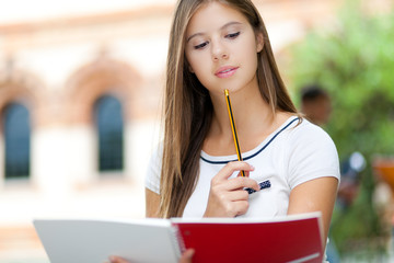 Female student studying outdoor