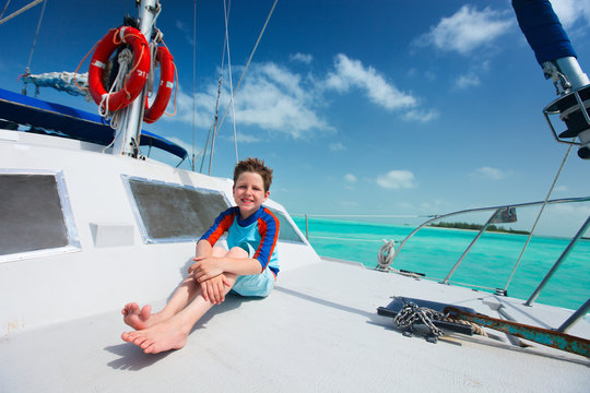 Little boy at luxury yacht
