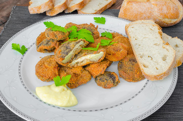 Breaded and fried mushrooms with homemade mayonnaise