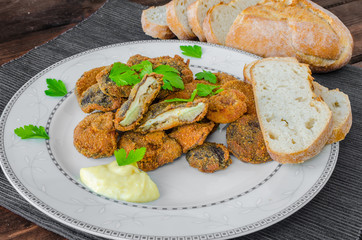 Breaded and fried mushrooms with homemade mayonnaise