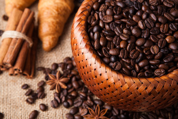 roasted coffee beans in a bamboo basket