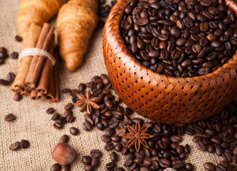 roasted coffee beans in a bamboo basket