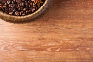 roasted coffee beans in a bamboo basket