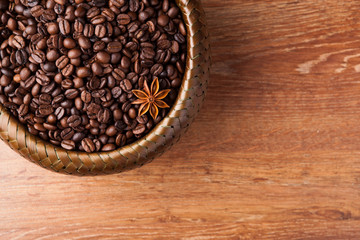 roasted coffee beans in a bamboo basket