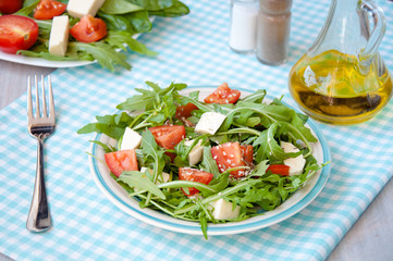 fresh salad with mozzarella, ruccola and tomatoes