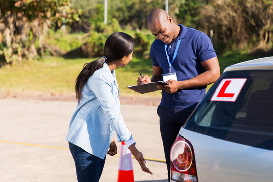female african student driver pre test inspection