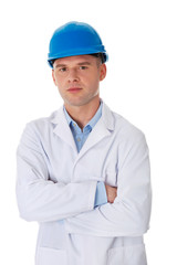 Man in a lab coat and helmet
