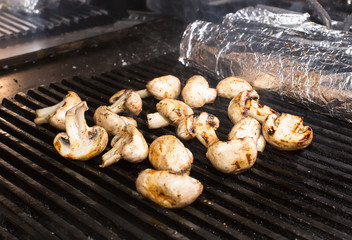 mushrooms grilling in the kitchen at the restaurant