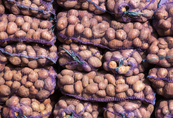 background of bags of potatoes