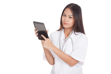 Asian young female doctor touch screen on tablet pc