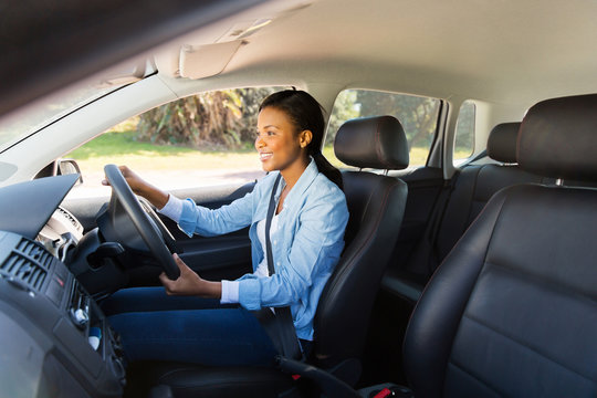 African Woman Driving A Car