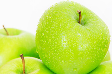 Close up fresh green apple with droplet