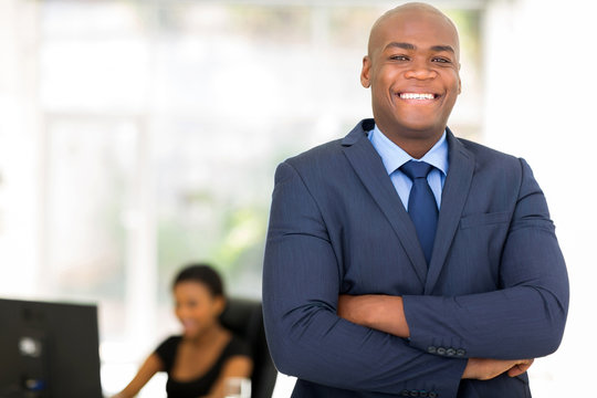 african american businessman with arms crossed