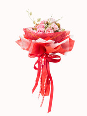 bouquet from pink roses with red ribbon