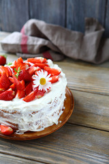 round cake with ripe strawberry