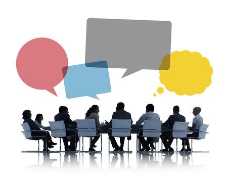 Silhouettes of People Discussing Teamwork