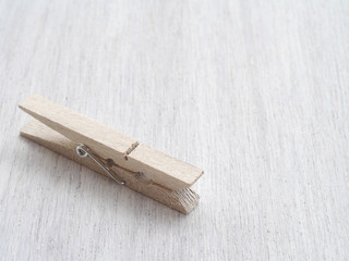 Wooden Cloth Pegs on wood Background