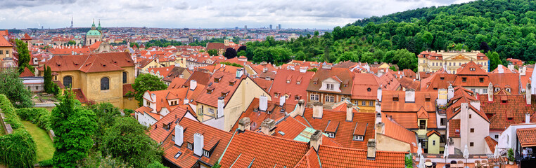 Fototapeta na wymiar Red roofs of Prague - panorama, Czech Republic