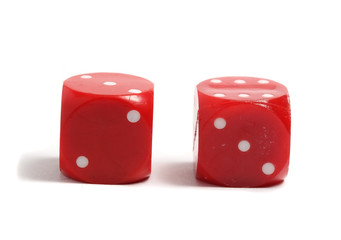two red dice for the game on white background