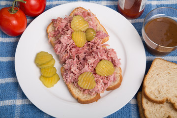 Sliced Pickles on Barbecue Pork Sandwich
