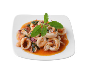 stir fried squid with chilli and basil isolated on white