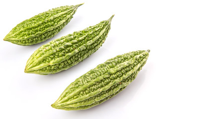 Bitter gourd vegetable over white background