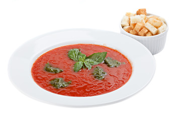 Bowl of tomato soup with croutons