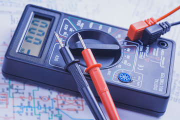 multimeter on the electrical circuit. close-up