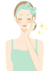 美容　スキンケアをする笑顔の女性