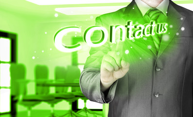 Businessman pushing CONTACT US sign