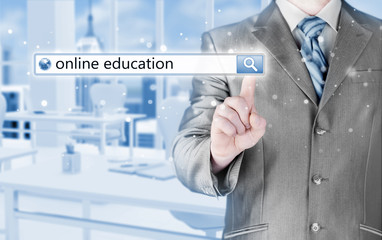 Online education written in search bar on virtual screen.