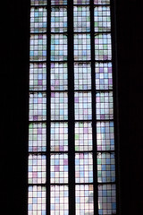 Interior of church with stained glass window designs