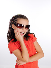 Girl flirting with her ​​sunglasses.