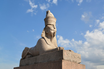 Ancient Egyptian sphinx in St. Petersburg against the blue sky