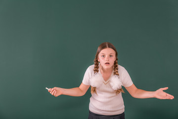 School Girl at a Chalkboard