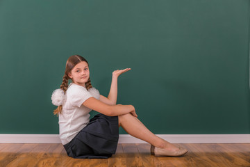 School Girl at a Chalkboard