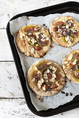 homemade rustic cookies with figs and almond slices on tray