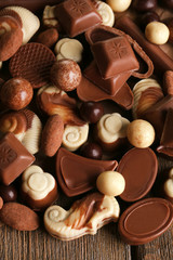 Different kinds of chocolates close-up background