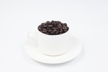 Coffee cup with coffee beans