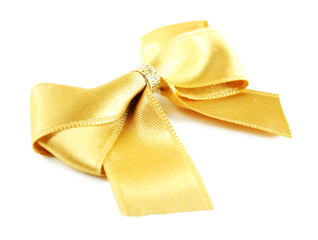Yellow silk bow isolated on white